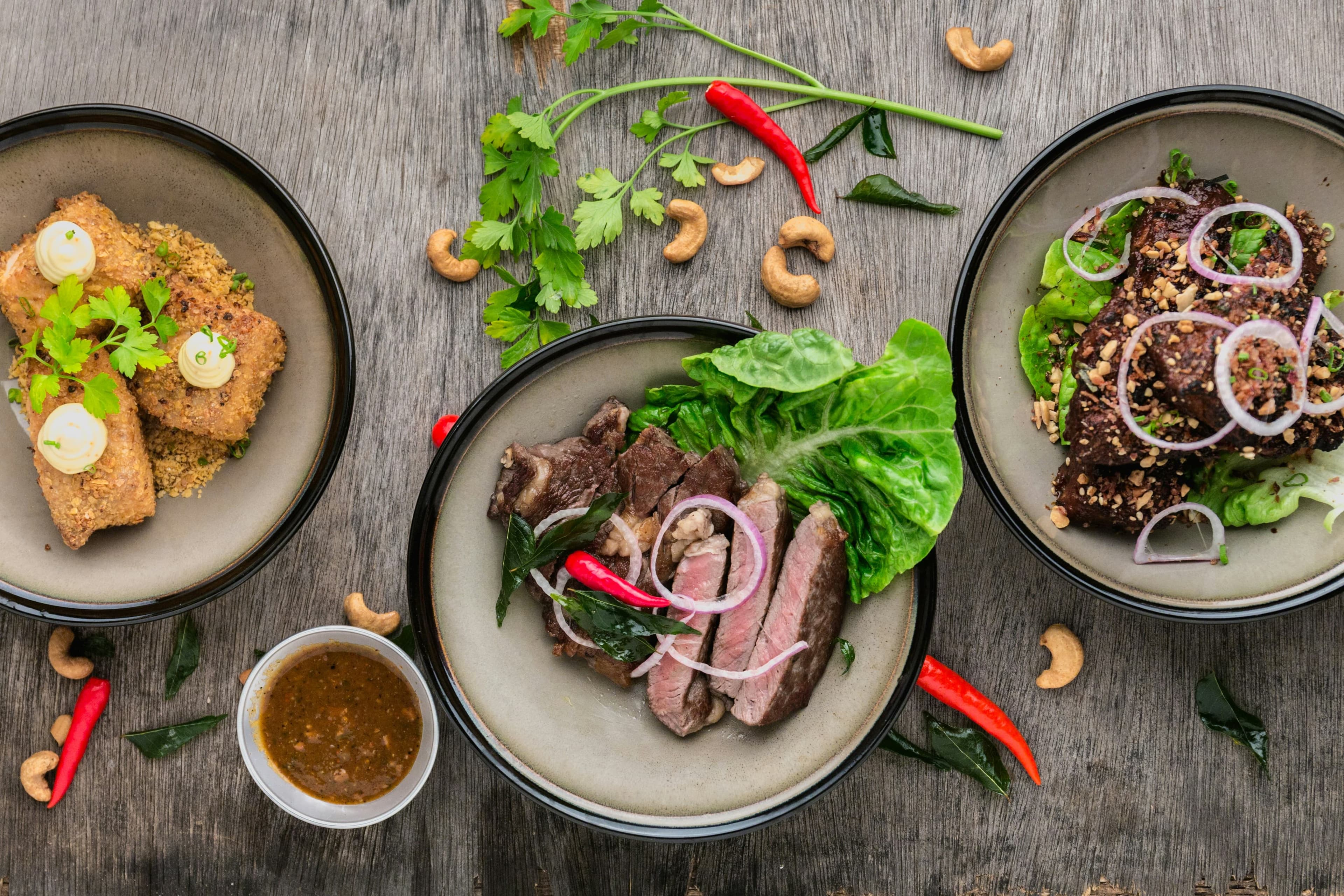 A collage of restaurant dishes and ambiance as a background for testimonials